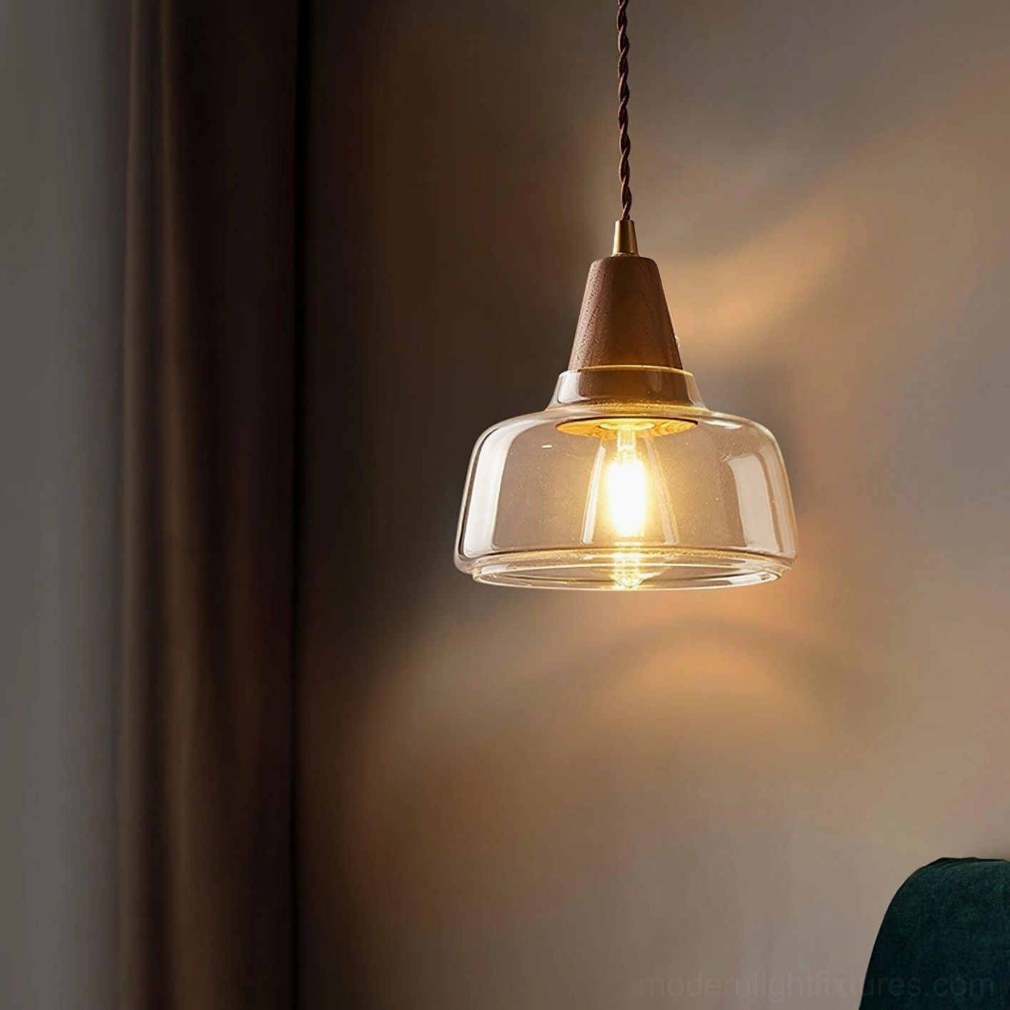Modern vintage pendant wall light with wooden fixture and clear glass shade - eye level residential interior view