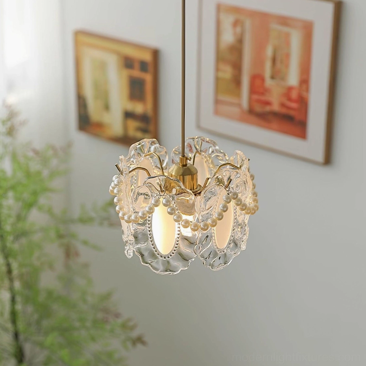Romantic retro petal pendant lamp hanging in living room with clear glass shade, brass hardware, and pearl beaded trim