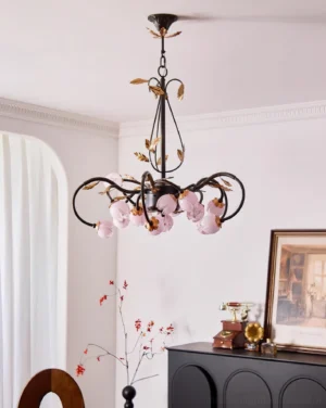 Giulia romantic chandelier mounted on white ceiling in vintage home interior with arched window, overhead installation view