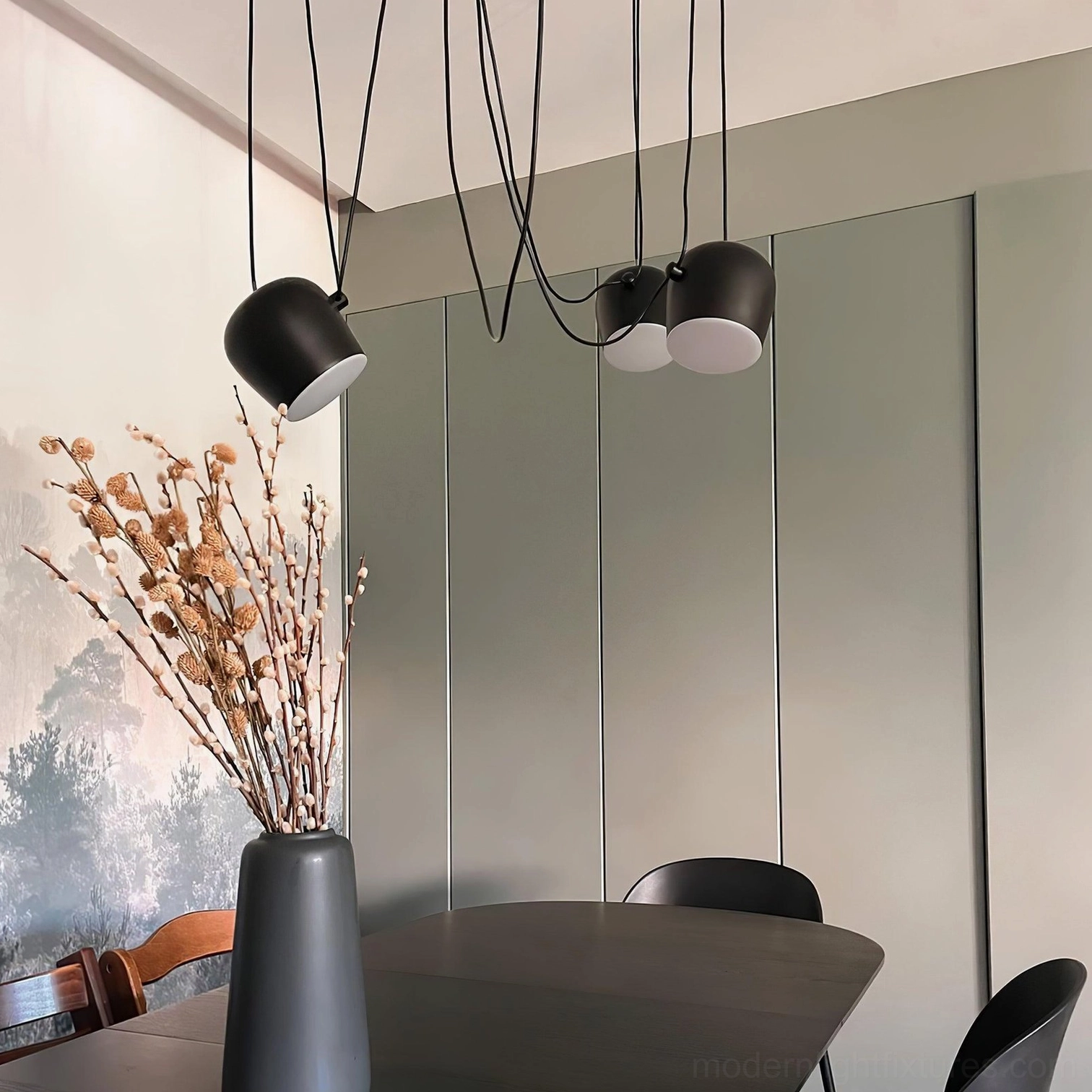 Ronan black cylindrical pendant light statement fixture modern space