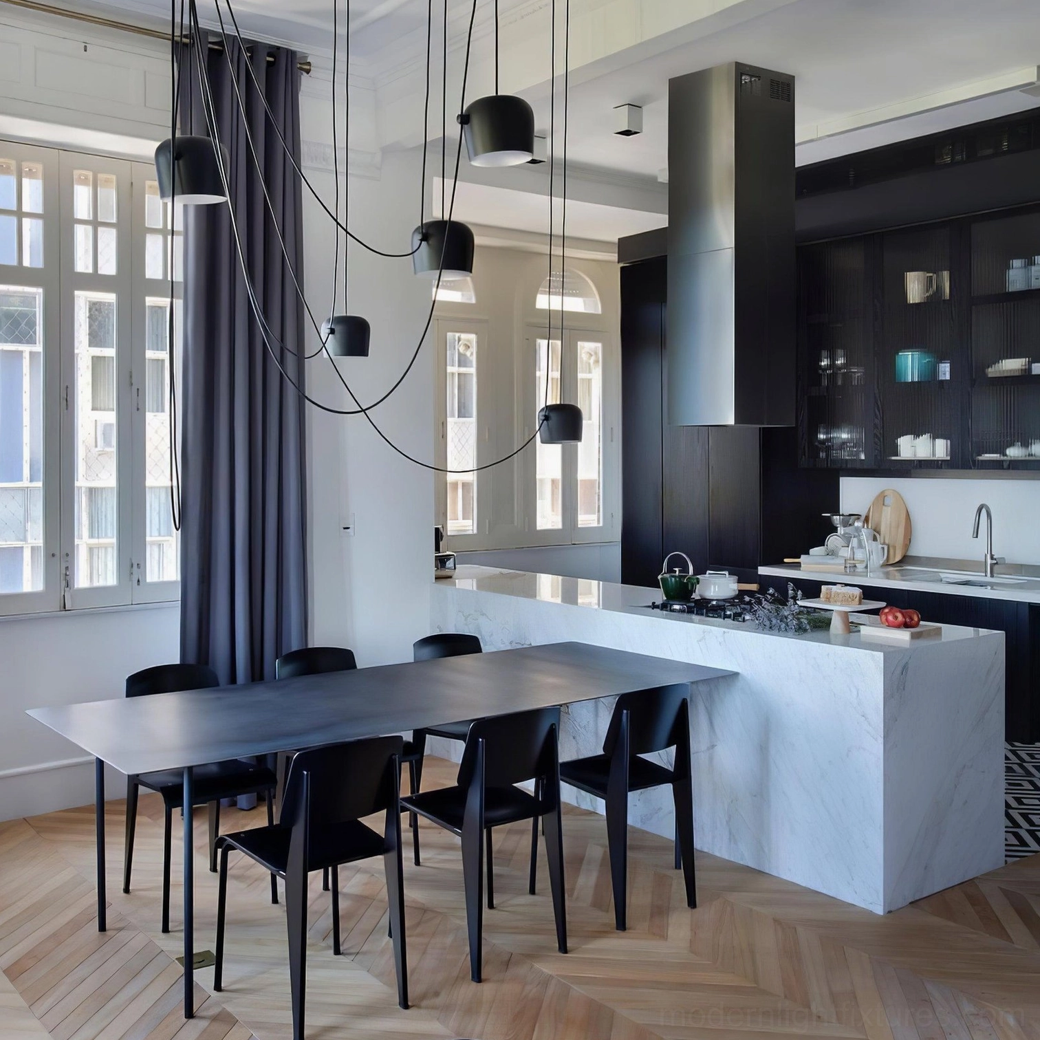 Multi-drop Ronan black pendant light set in modern open-plan kitchen-dining room with industrial minimalist style