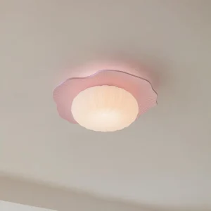 Rory pink flush mount ceiling light installed on ceiling showing mounted detail, warm white 3000K ambient lighting, close-up ruffled edge design