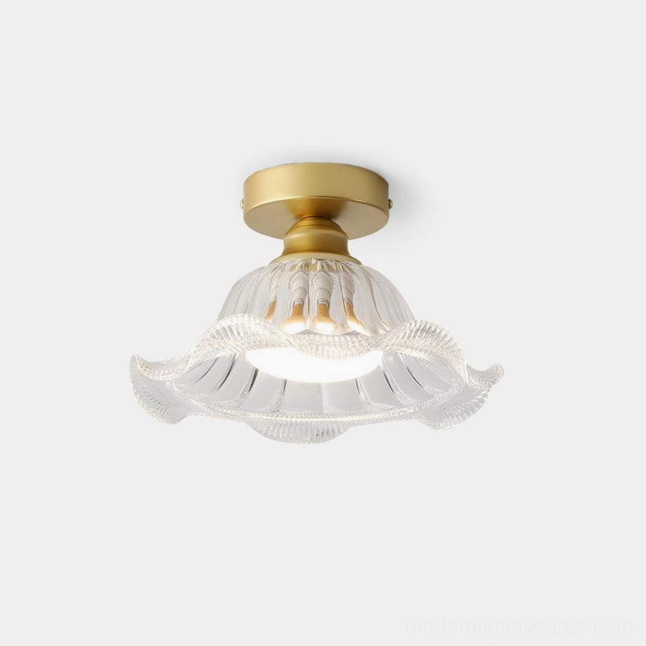 Rosa geometric glass flush mount ceiling light with ruffled glass shade and brass gold canopy, close-up detail view