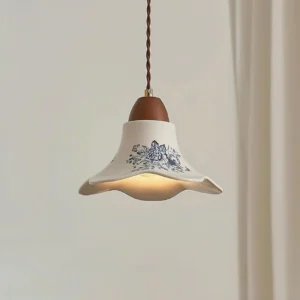 Rosalie ceramic pendant lamp walnut and white finish illuminated indoors with warm ambient glow