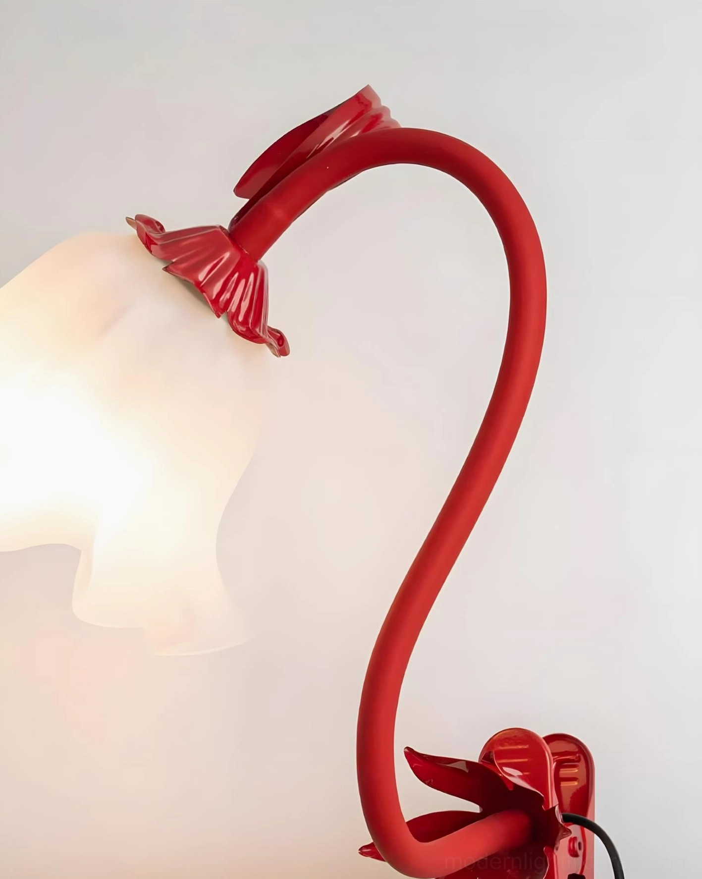 Rosalie sculptural lamp in soft lavender on nightstand creating cozy bedroom ambiance and mood lighting