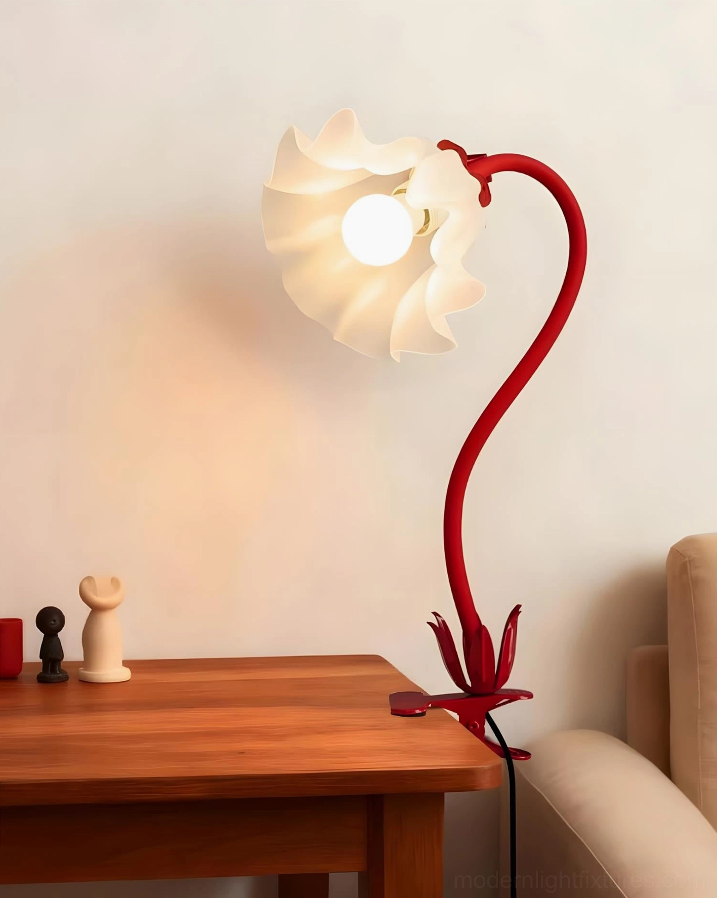 Blush pink Rosalie floral lamp displayed on console table in entryway with botanical themed styling