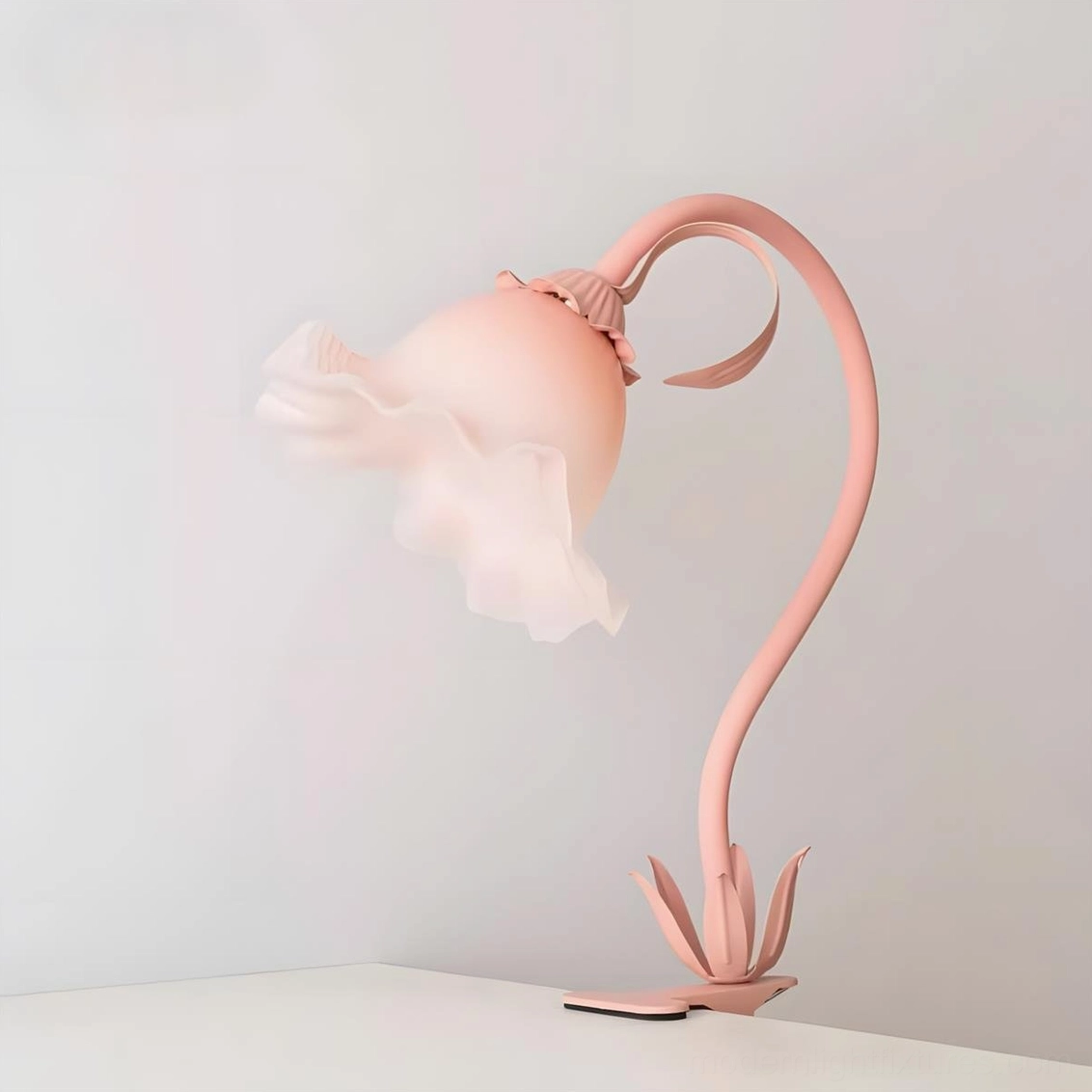 Rosalie blush pink table lamp featuring sculptural petal base and ruffled glass shade detail shot