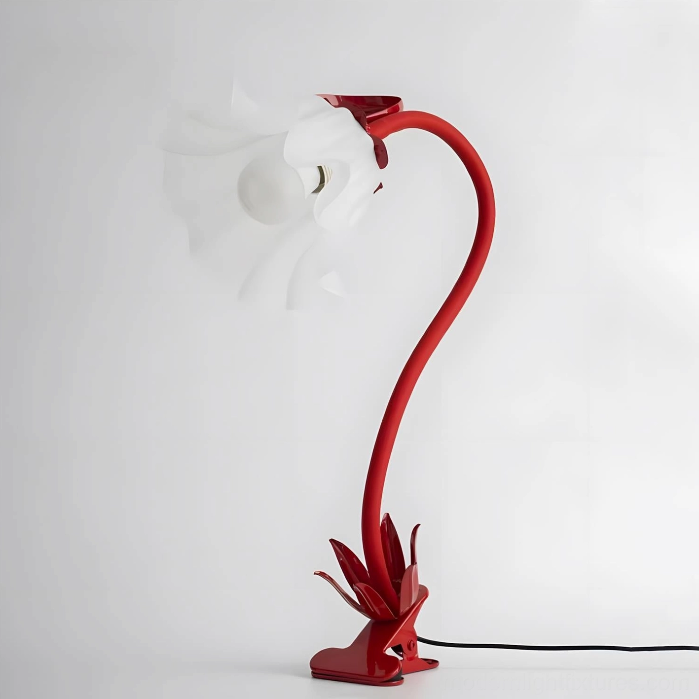 Vivid red Rosalie sculptural table lamp with frosted glass shade and botanical metal base design