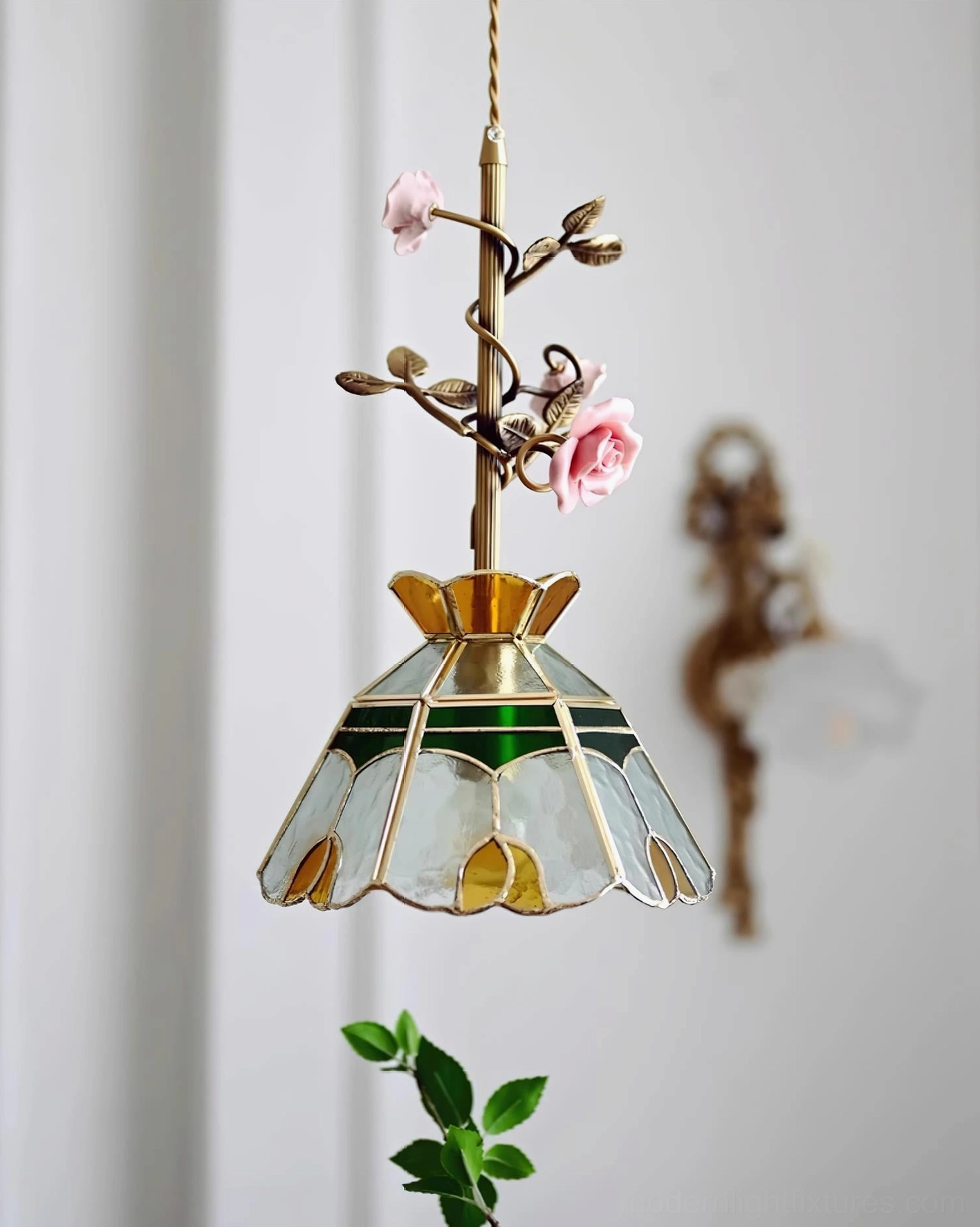 Rosavine floral pendant light fixture detail view showing hand-sculpted roses and antique brass finish