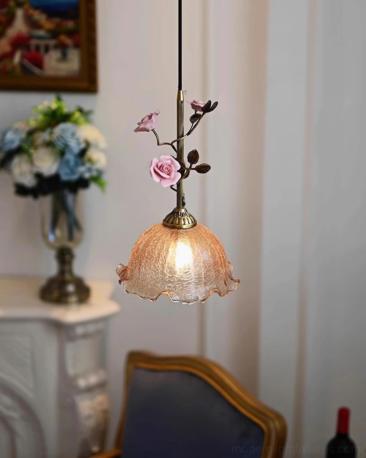 Rosavine pendant light with frosted textured glass shade and pink flower details, side view in European interior hallway