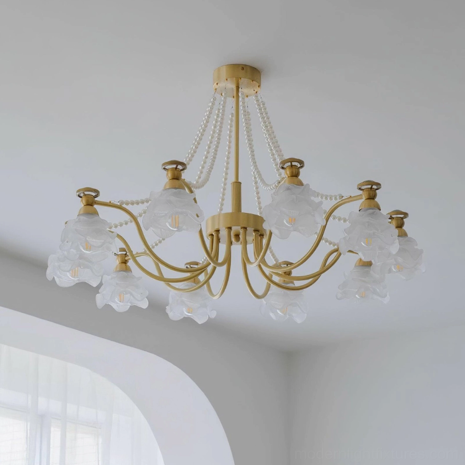 Rose glass chandelier with decorative beaded chains and frosted petal shades - side angle view