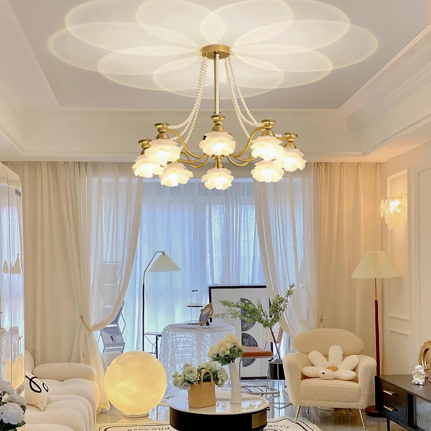 Rose glass ceiling light in cream residential living room creating warm petal-shaped light projection