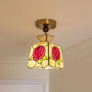 Rose stained glass semi-flush ceiling light installed in residential interior with vintage romantic decor and warm neutral tones