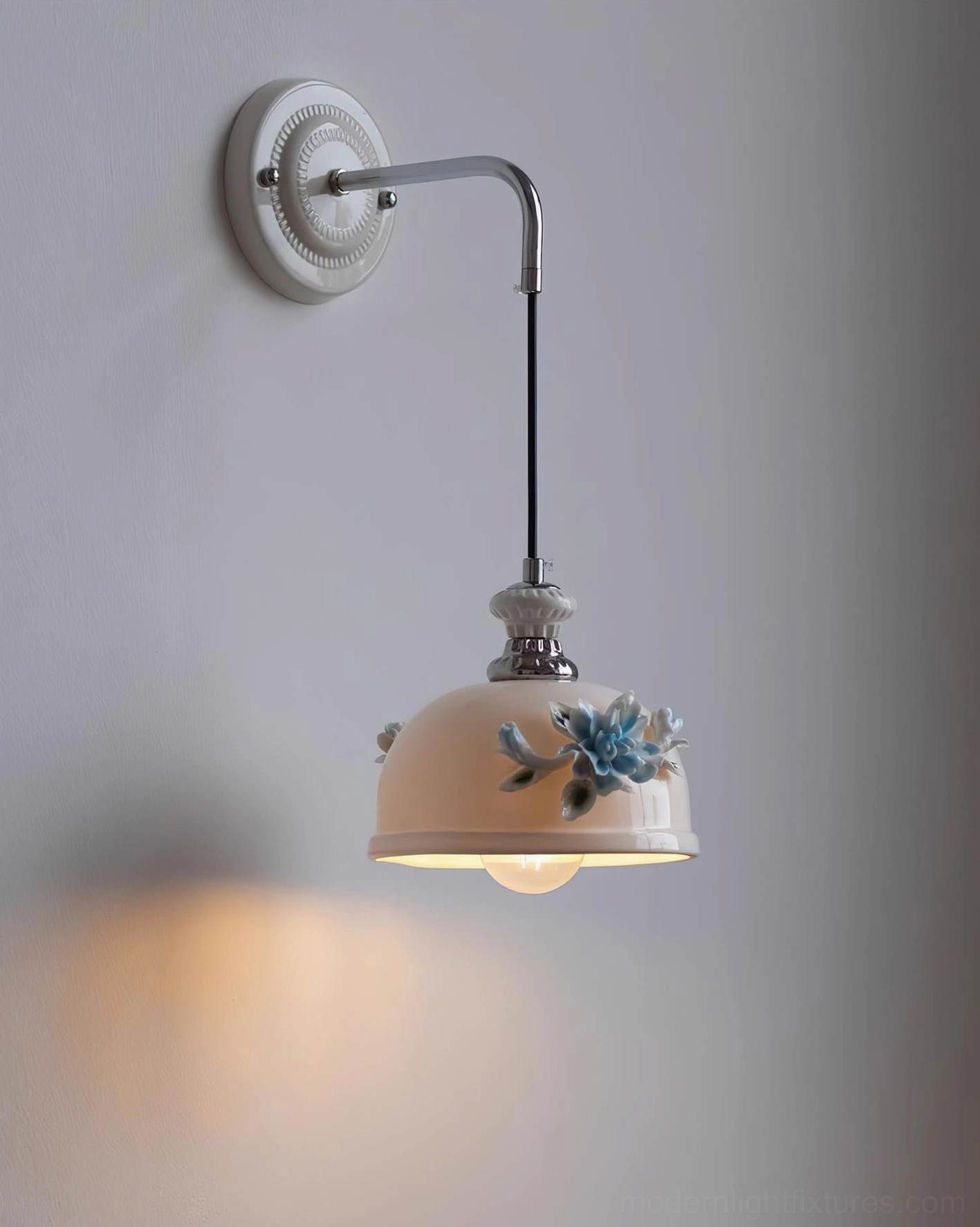 Roselune ceramic wall lamp showing light diffusion through hand-sculpted floral shade in warm ambient setting