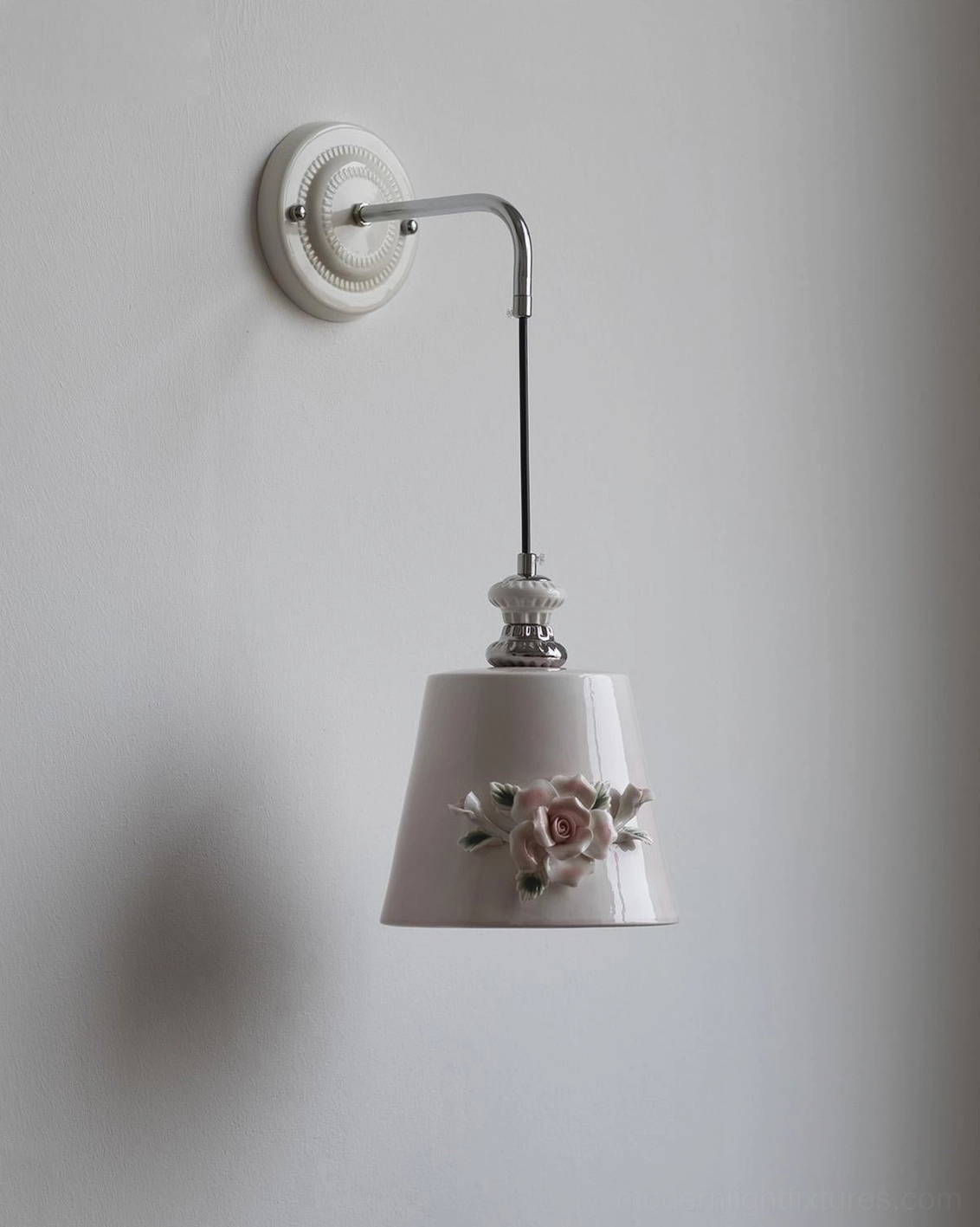 Roselune ceramic wall lamp showing porcelain shade craftsmanship with botanical floral patterns and soft pastel tinting