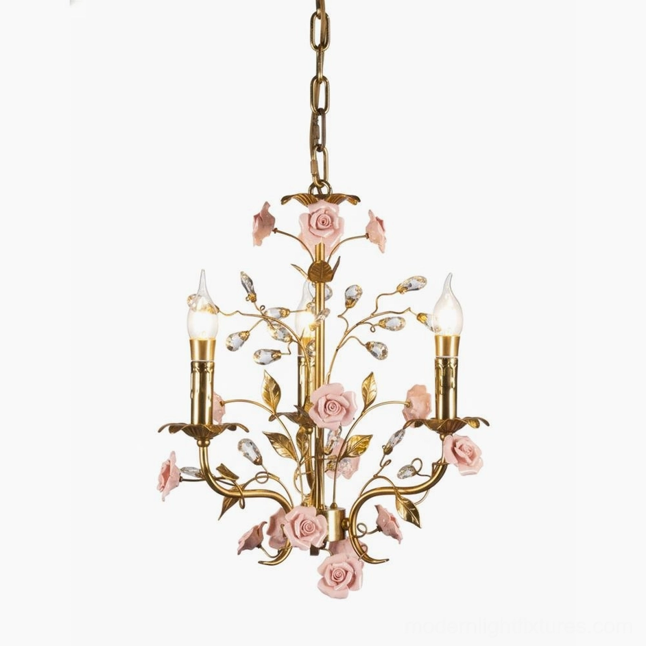 Roselune brass and ceramic pendant chandelier with crystal accents, artistic studio presentation