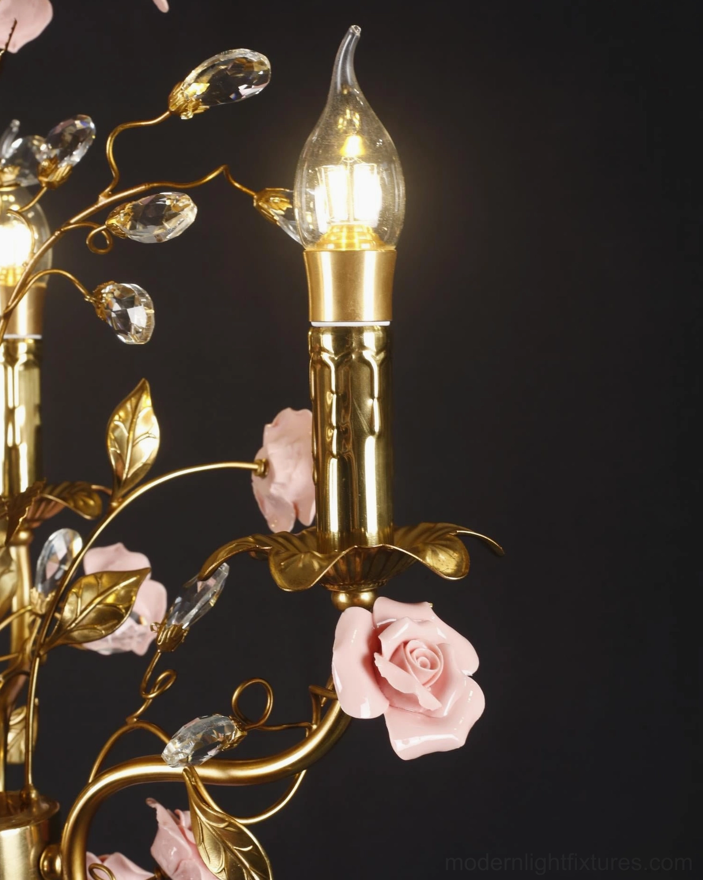 Roselune botanical pendant light with handcrafted ceramic roses and vintage brass framework details