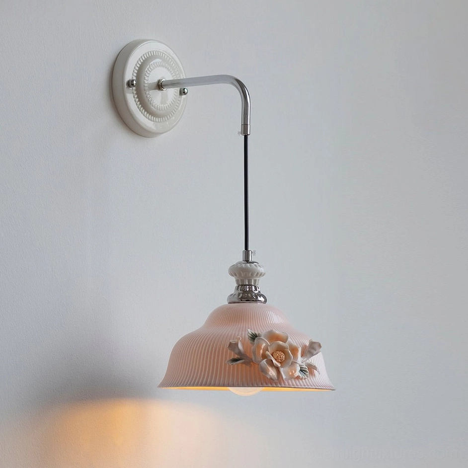 Model C Roselune pink ceramic wall sconce with hand-sculpted flowers and polished metal bracket installation