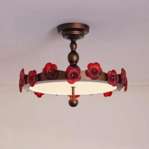 Romantic vintage-style ceiling light fixture mounted in residential space with frosted diffuser and spherical finial, three-quarter view