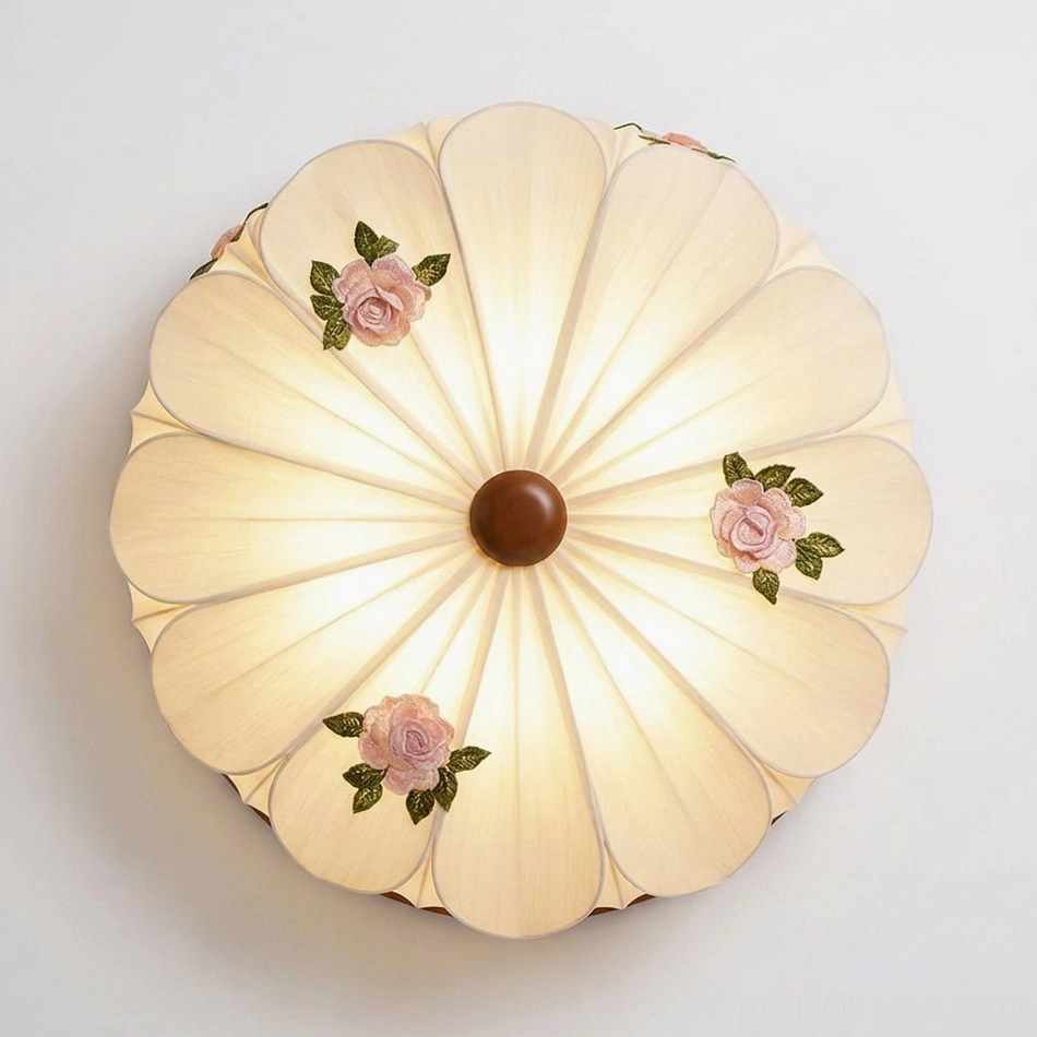 Rosienne rose pattern petal flush mount with dark-wood trim and pink embroidered linen shade, direct front close-up