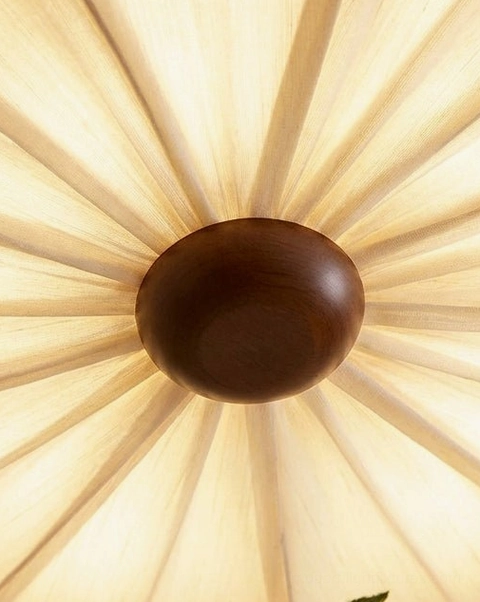 Rosienne solid-wood rim and dark-wood center cap structural detail with linen fabric attachment