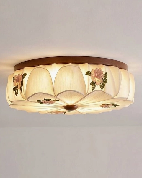 Rosienne wood-trimmed floral ceiling light showing curved fabric shade petals, dark-wood center cap, rose fabric prints