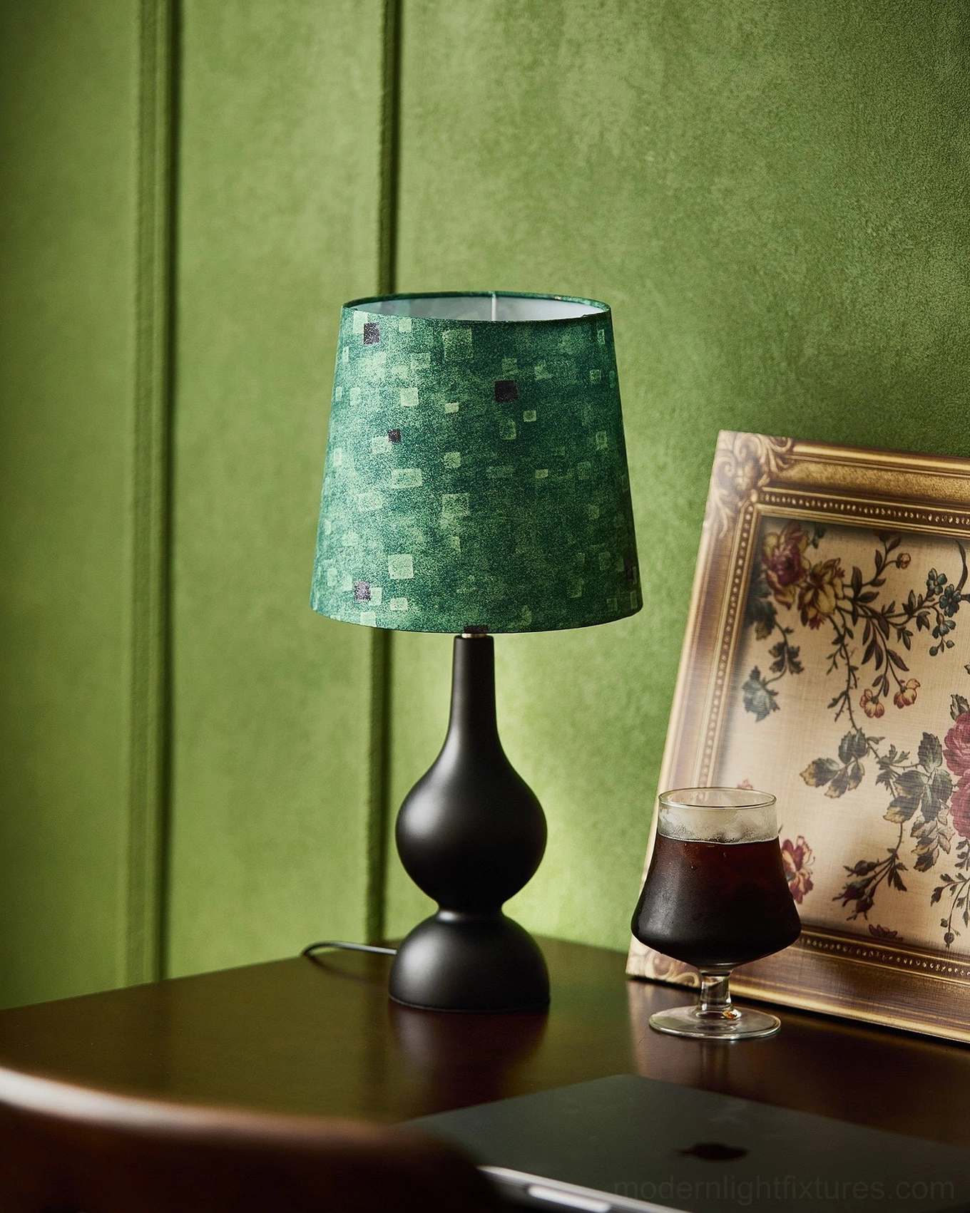 Rosmira table lamp with green checkered shade on vintage home desk, brass stem and dark walnut base, lifestyle scene