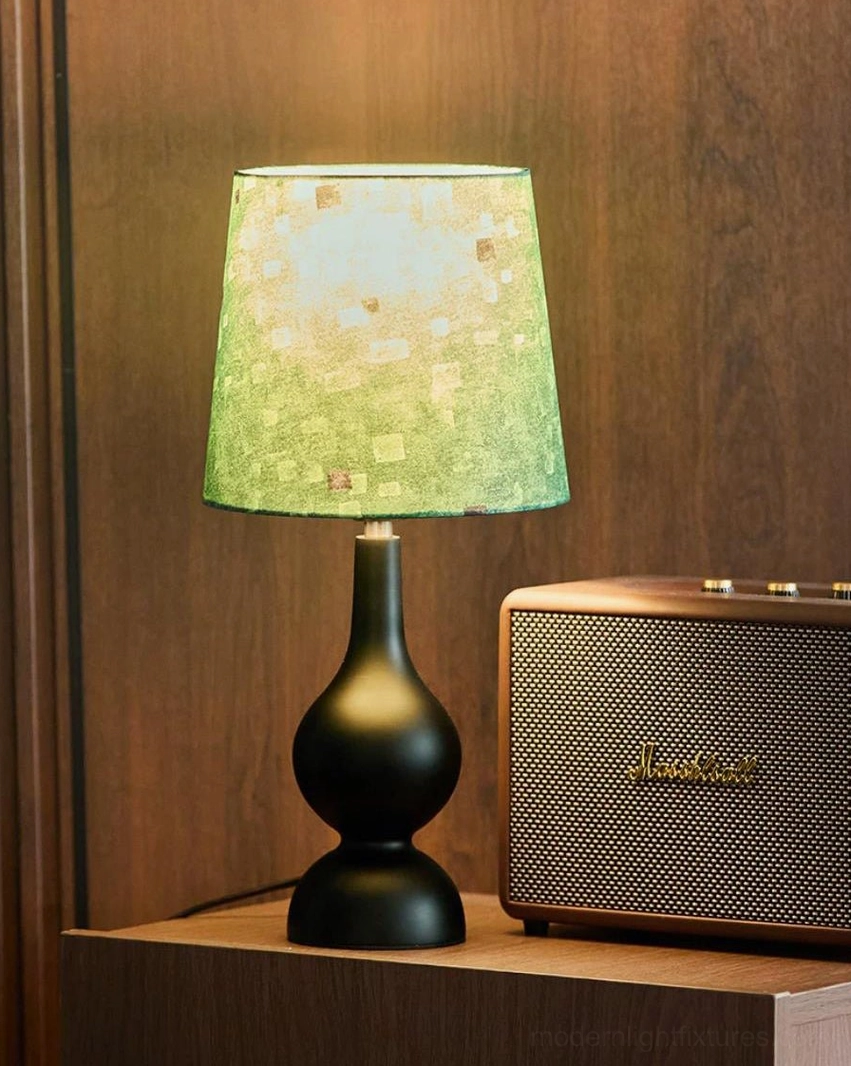 Vintage-style wooden table lamp with green check weave shade and gourd-shaped walnut base on wooden shelf display