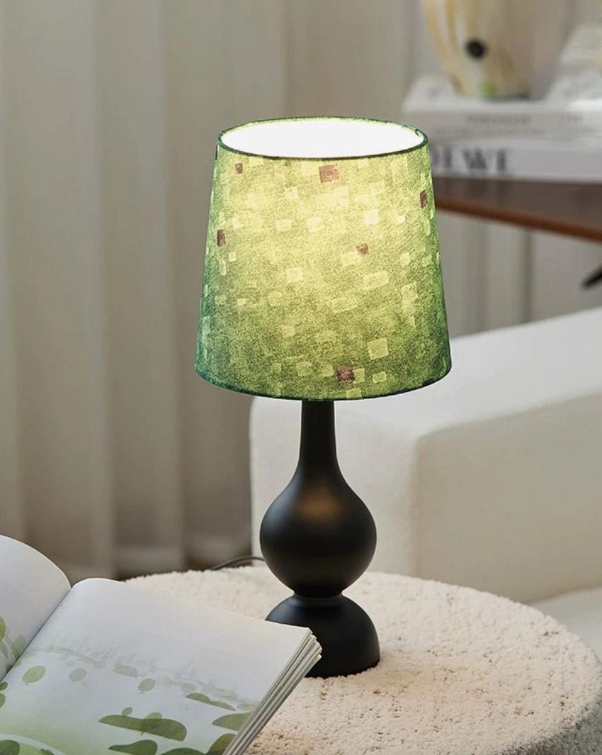 Minimalist side table setup with Rosmira table lamp featuring light green checkered shade and gourd-style base, reading lamp