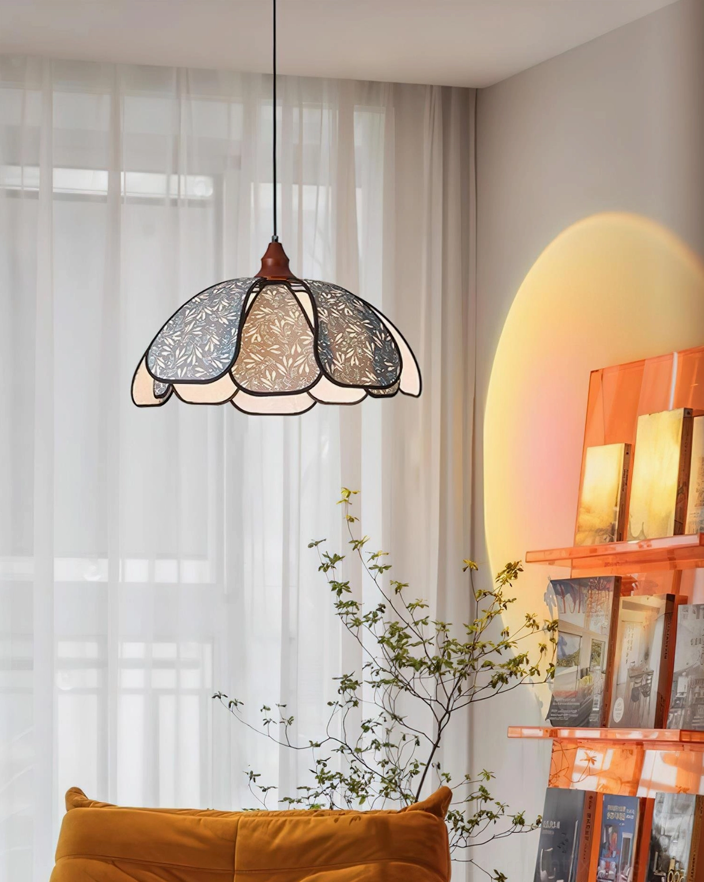 Rosmira fabric pendant light fixture detail showing wood crown, etched floral pattern, and light diffusion quality