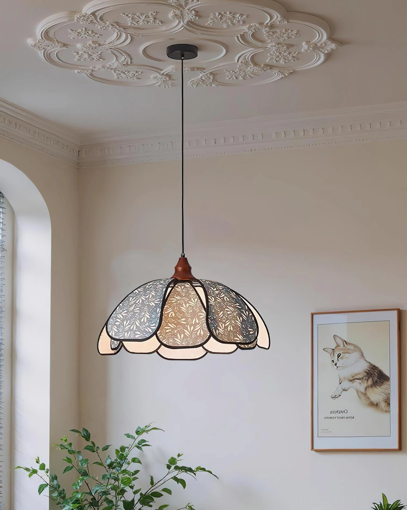Contemporary fabric pendant light with scalloped petal shade, shown hanging in modern minimalist room setting