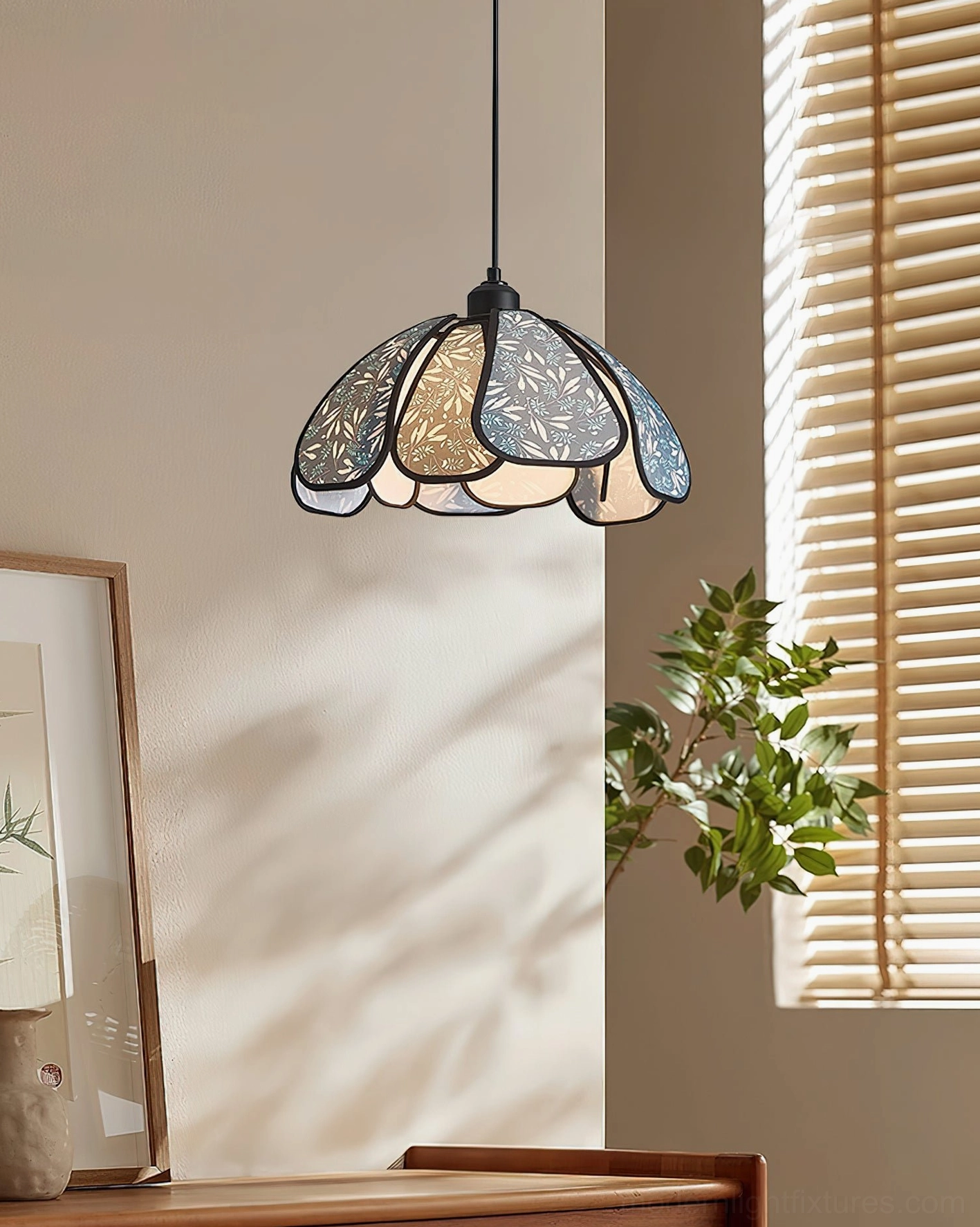 Compact Rosmira floral pendant light suspended in residential console corner with small scalloped leaf-etched shade design
