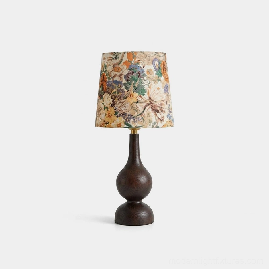 Rosmira ash wood table lamp with floral fabric shade and walnut gourd-shaped wooden base, front studio view