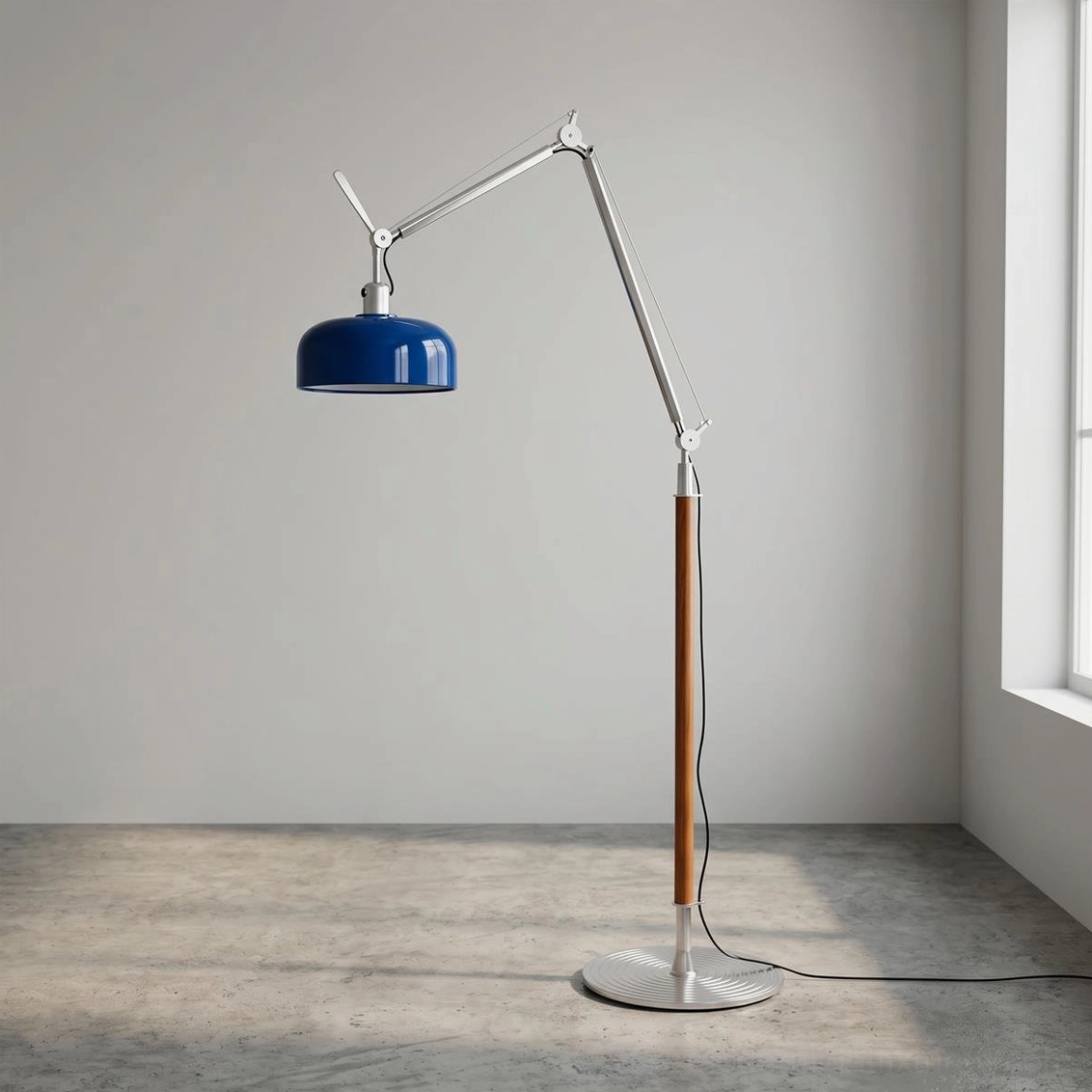 Rosso floor lamp with cobalt blue dome shade featuring aluminum base and wooden pole studio view