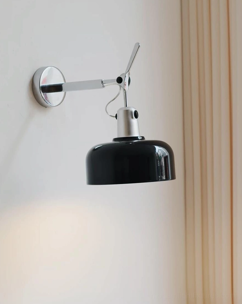 Rosso mid-century industrial wall sconce detail shot showing chrome arm, hinged joint, and tension lever