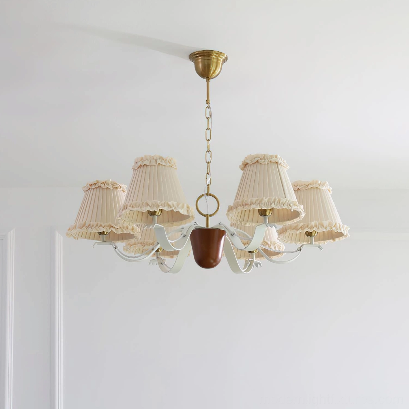 Rosvyn vintage-inspired fabric chandelier with brass accents in warm glowing bedroom setting