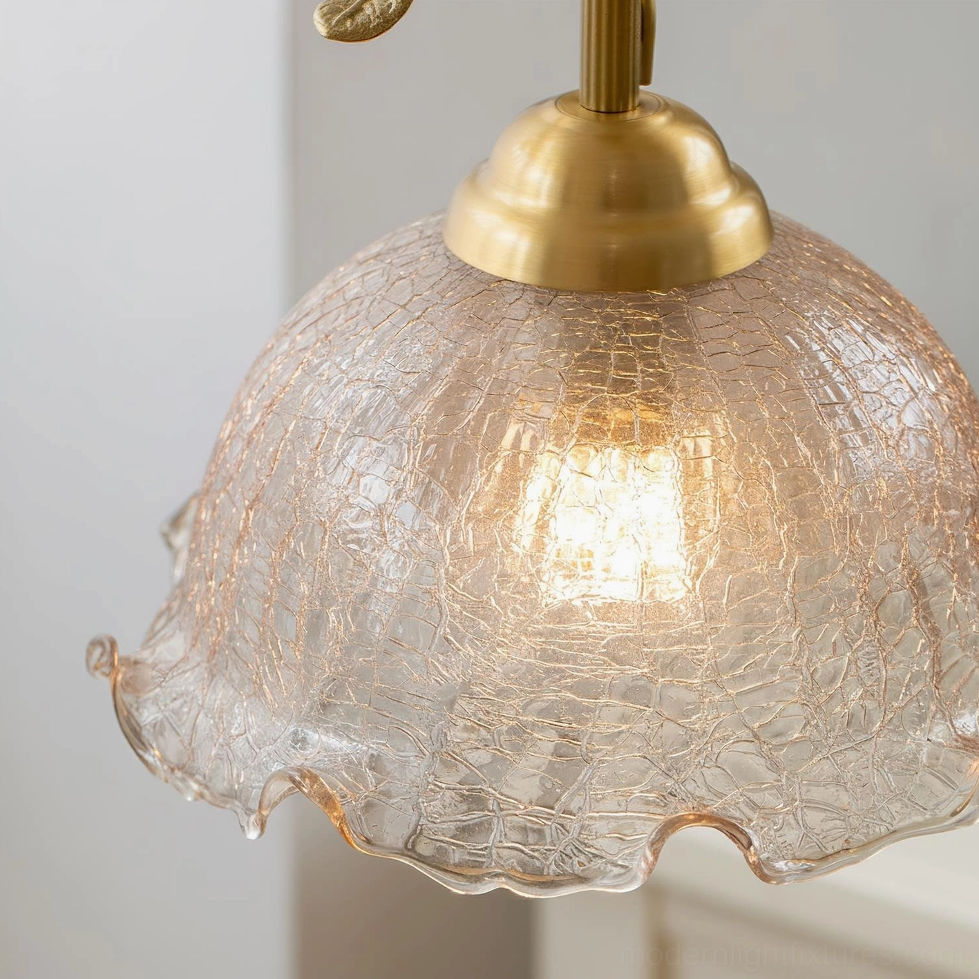 Rosy Reverie floral pendant fixture with hand-painted ceramic roses, curved brass metal framework, and romantic vintage aesthetic