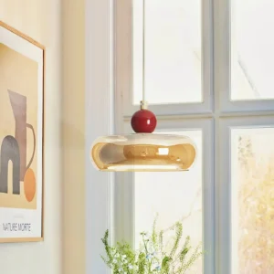 Modern rotan pendant fixture installed beside window - side view home interior