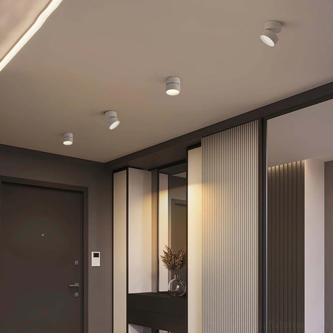 Modern apartment entryway featuring light gray rotatable ceiling light mounted flush for minimalist aesthetic