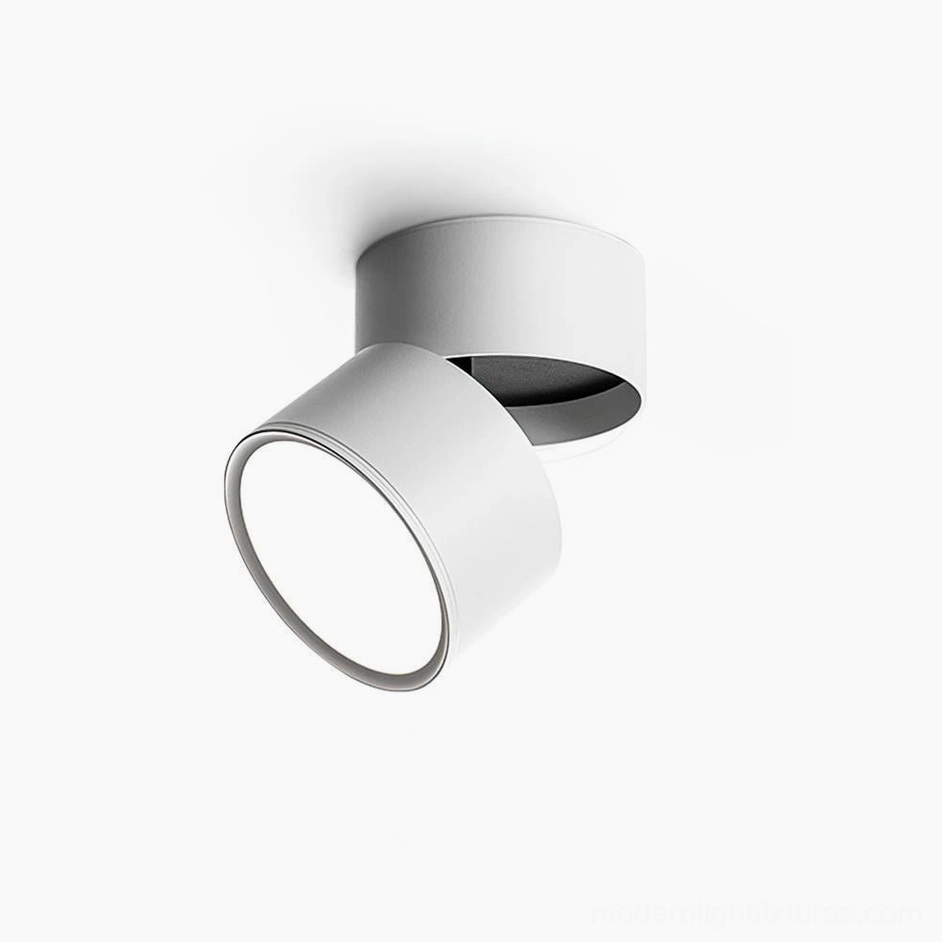 Set of rotatable ceiling spot lights in coordinated white finish for multi-unit modern lighting system