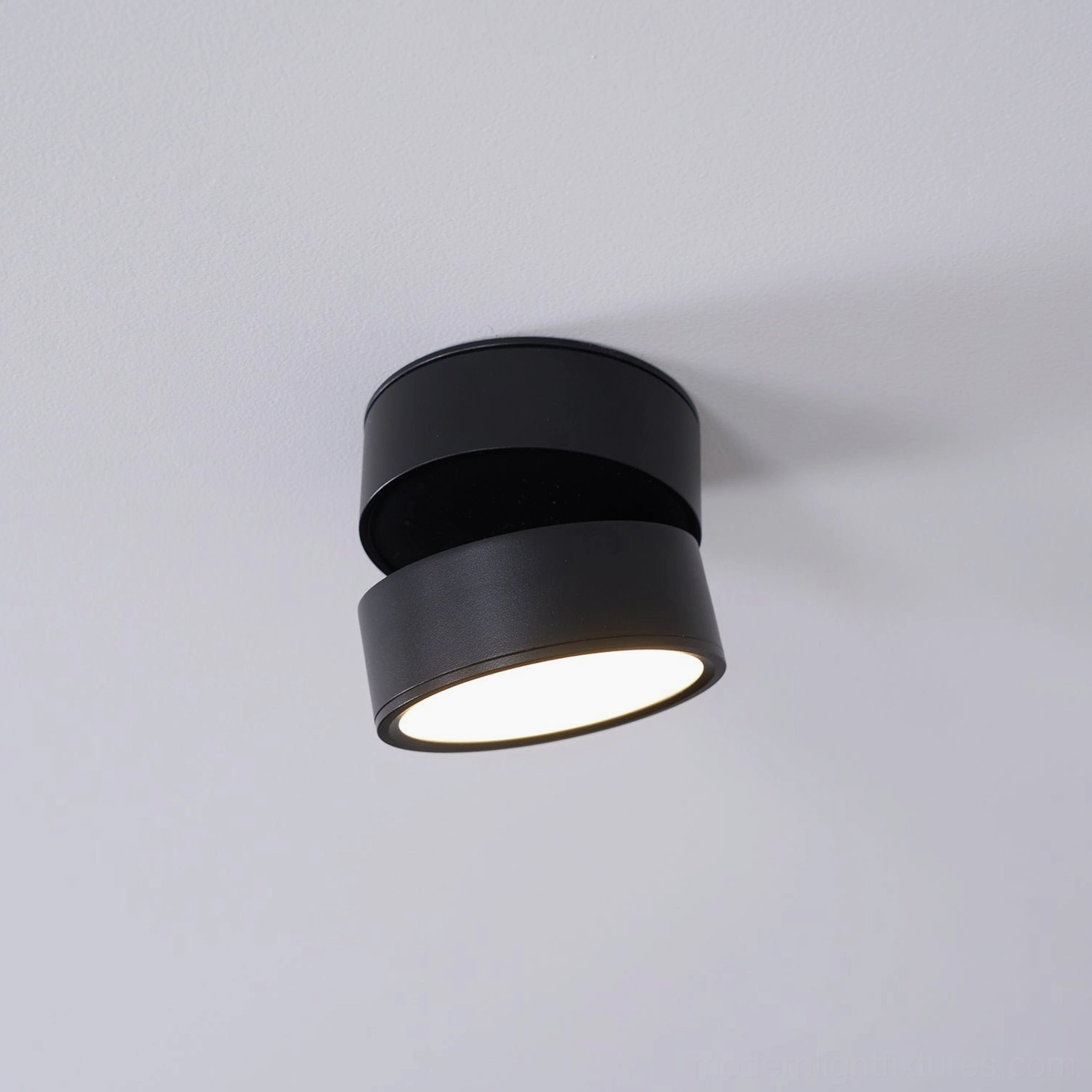 Rotatable spot light fixture with 7W warm white LED showing application for reading and accent lighting