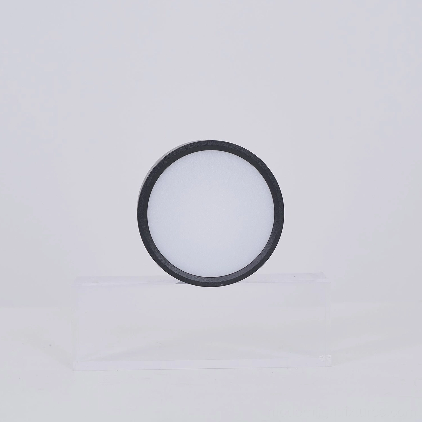 Rotatable surface light fixture with full articulation showing 90-degree tilt and complete rotation range