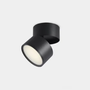 Rotatable surface spot light with full 360-degree rotation capability in matte black finish, showing adjustable head design