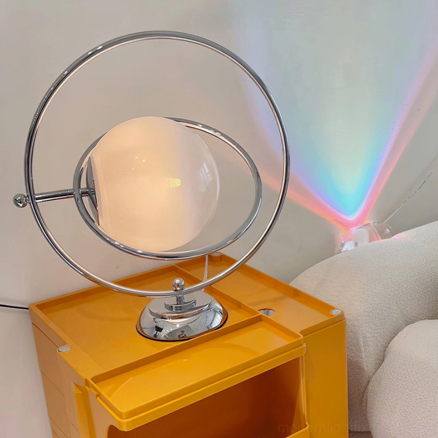 Chrome and frosted glass rotating planet table lamp lighting effects