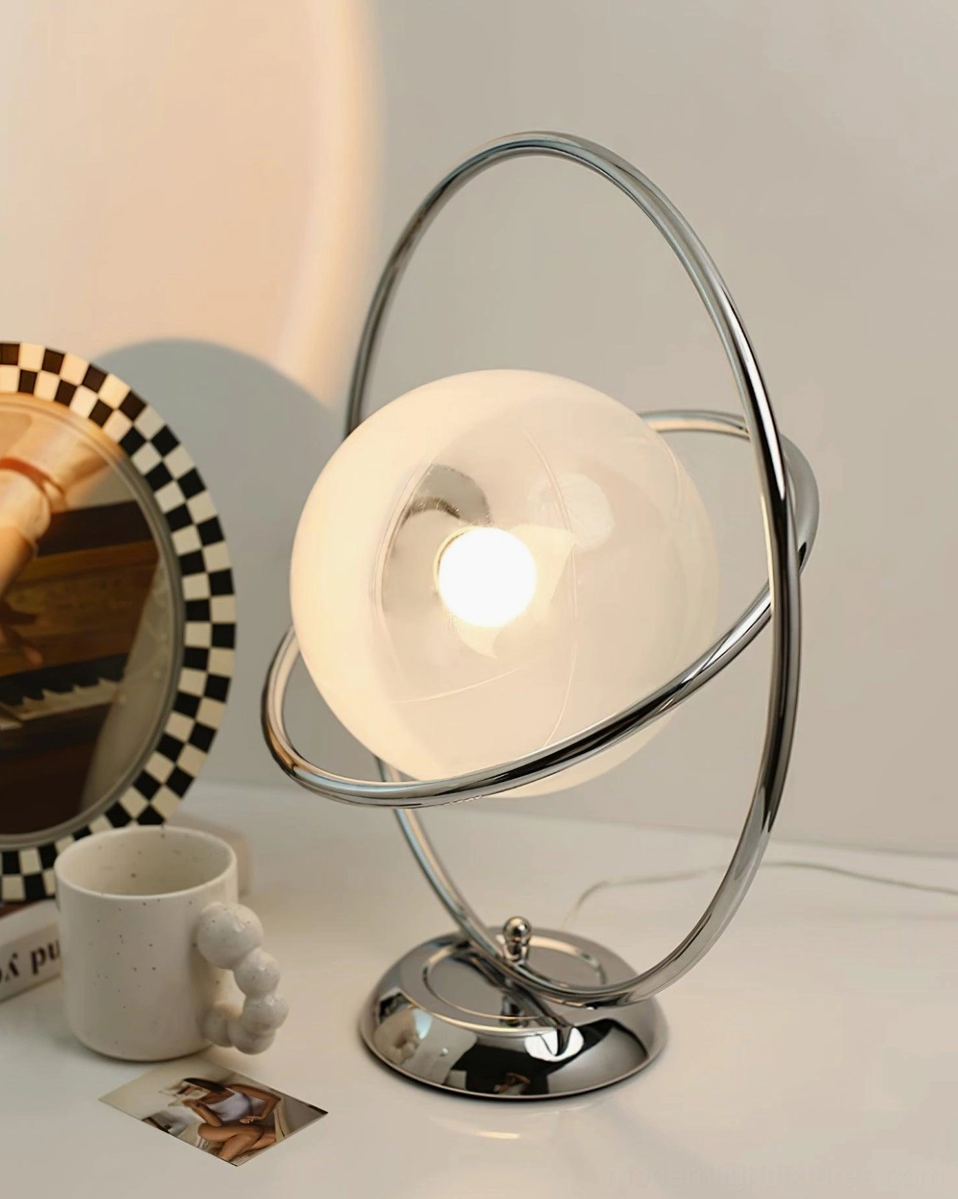 Modern rotating planet table lamp complete product lifestyle display