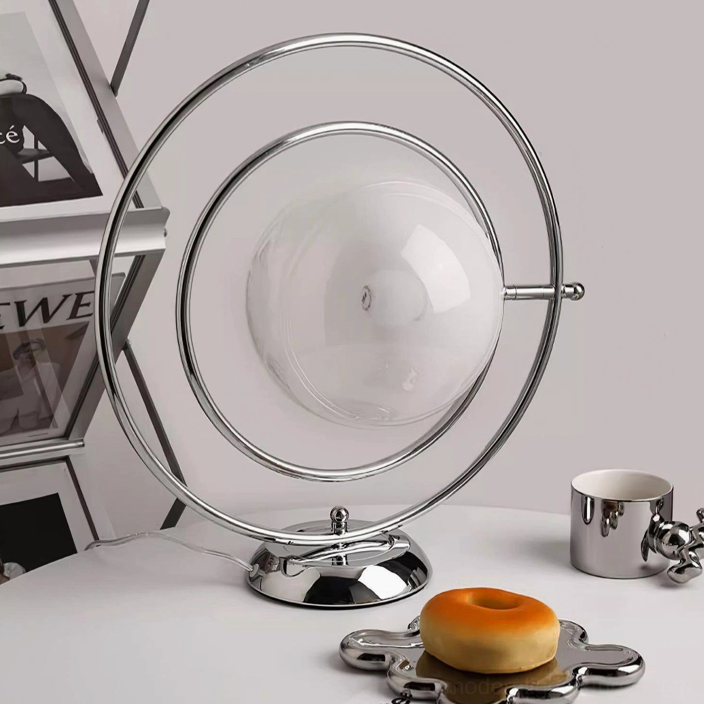 Rotating planet table lamp contemporary design element in styled interior