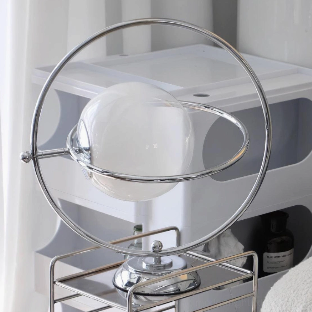 Chrome and glass rotating planet table lamp modern design showcase