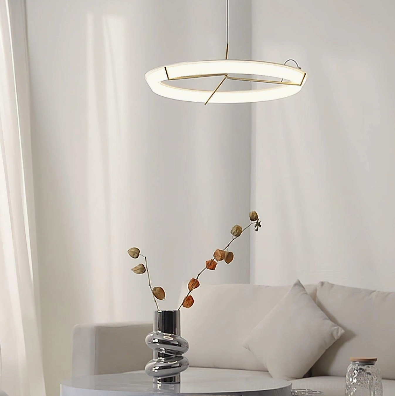 Modern round acrylic pendant light with adjustable suspension cord for various ceiling heights