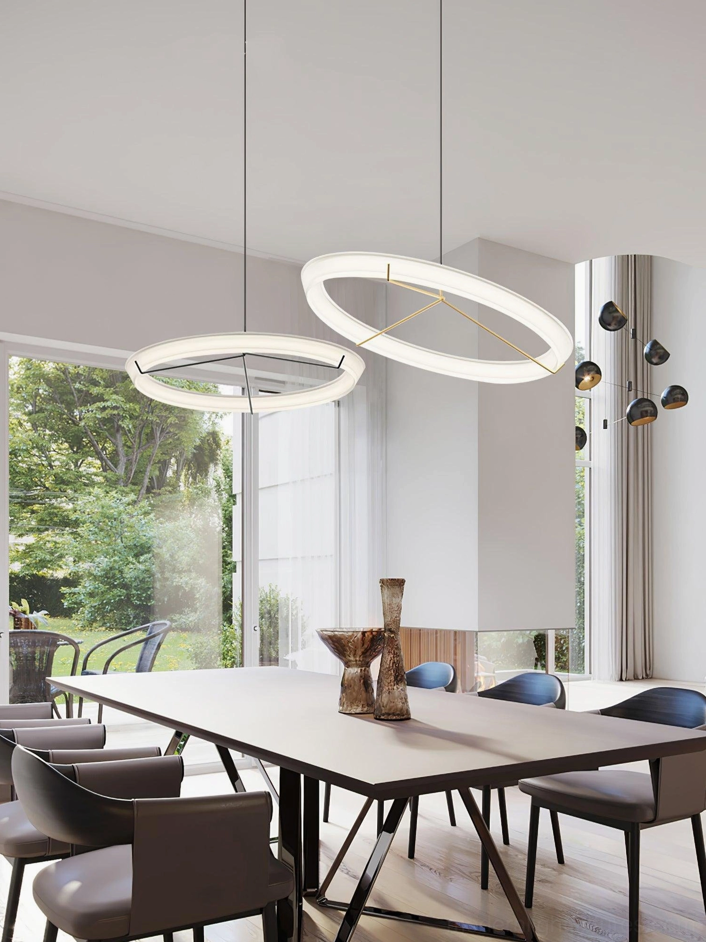 Bright modern dining room with matching white round pendant lights and natural daylight from windows