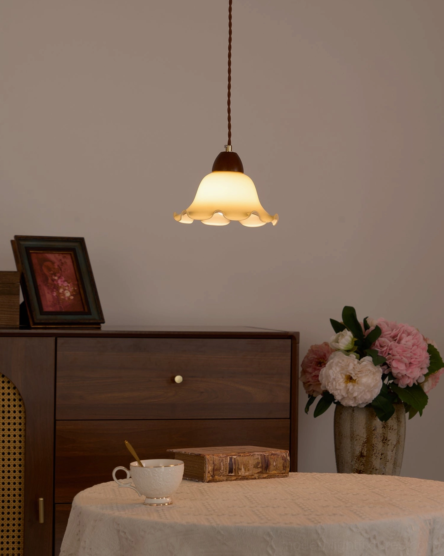 Modern rowan flower pendant light installation showing adjustable wire and ceiling mounting hardware